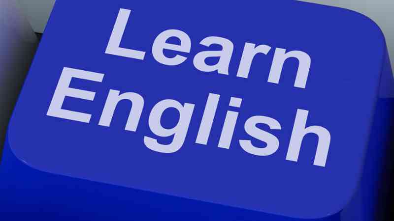 Tecla azul con el texto 'Learn English' — cursos online